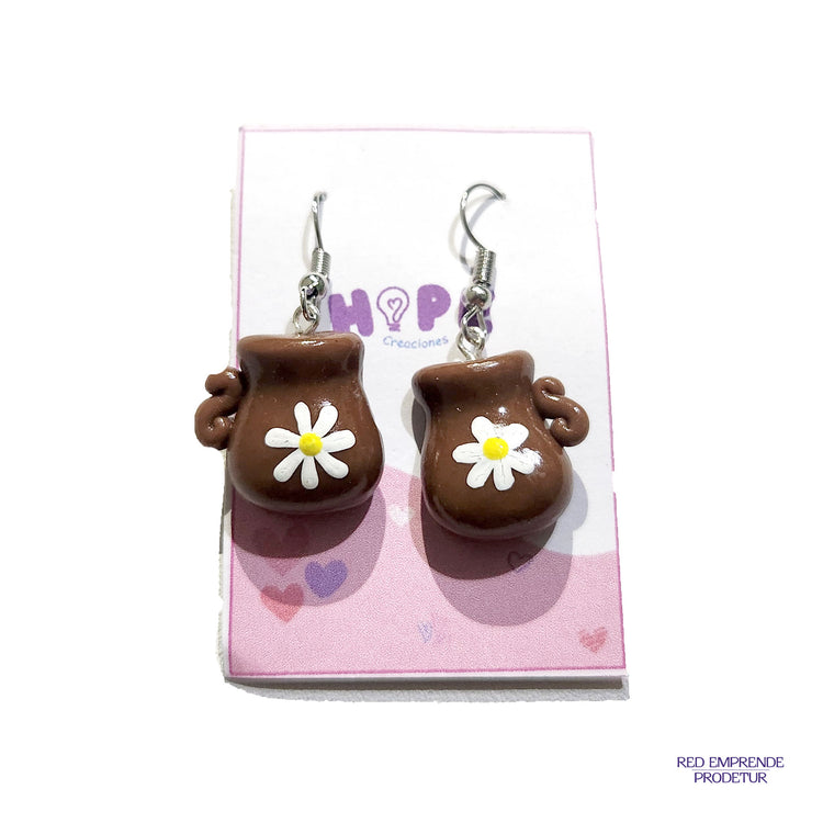 Aretes en forma de batidor de barro